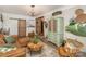 Cozy living room showcasing modern barn doors, a stylish sofa, and chic decor at 127 Wright Cir, Cherryville, NC 28021
