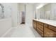 Spacious bathroom featuring a double vanity and tile flooring at 13134 Macon Hall Dr, Mint Hill, NC 28227