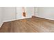 Bedroom with hardwood floors and an open doorway to a bathroom at 13134 Macon Hall Dr, Mint Hill, NC 28227