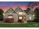 Charming home featuring well-manicured lawn and craftsman-style details and pleasing color scheme at 132 Tuskarora Point Ln, Mooresville, NC 28117