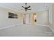 Comfortable bedroom with neutral carpet, recessed lighting, ceiling fan, and access to a bathroom at 14629 Glen Valley Ct, Charlotte, NC 28278