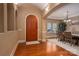 Inviting entryway with arched doorways, hardwood floors, and a view into the dining room at 1974 Glen Manor Ct, Lincolnton, NC 28092