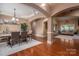 Inviting living space with hardwood floors, an open floor plan, and elegant archways at 1974 Glen Manor Ct, Lincolnton, NC 28092