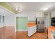 Retro kitchen featuring white cabinetry, stainless steel appliances, and orange countertops at 223 Oakland Cir, Newton, NC 28658