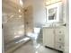 Bathroom showcasing a walk-in shower, with modern vanity and neutral color palette at 2302 Rayecliff Ln, Charlotte, NC 28214