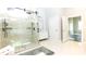 Modern bathroom featuring glass-enclosed shower and single sink vanity at 2302 Rayecliff Ln, Charlotte, NC 28214