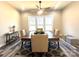Dining room boasting natural light, a wood table, and a contemporary ceiling fan at 2302 Rayecliff Ln, Charlotte, NC 28214