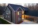 Striking exterior of brick home featuring a two-car garage and manicured lawn, perfect for Gathering living at 2302 Rayecliff Ln, Charlotte, NC 28214