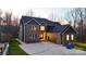 Beautiful two-story home featuring brick and dark siding, and inviting entryway at 2302 Rayecliff Ln, Charlotte, NC 28214