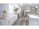 Spacious kitchen with white cabinetry, modern stainless steel appliances, and ample counter space at 2302 Rayecliff Ln, Charlotte, NC 28214