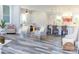 Open-concept living area flowing into a modern kitchen, featuring stylish seating and ample natural light at 2302 Rayecliff Ln, Charlotte, NC 28214