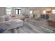 Spacious living room featuring hardwood floors, neutral decor, and an open concept design at 2302 Rayecliff Ln, Charlotte, NC 28214