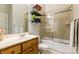 Charming bathroom with tiled shower and modern floating shelves at 258 Ridge Reserve Dr, Lake Wylie, SC 29710