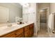 Bright bathroom features double sinks, a large mirror, and tile flooring at 258 Ridge Reserve Dr, Lake Wylie, SC 29710
