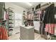 Organized walk-in closet with custom shelving, drawers, and ample storage space at 258 Ridge Reserve Dr, Lake Wylie, SC 29710