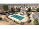 Aerial shot showcasing a large community pool area with a covered pool, pool house and playground at 2808 Thornbush Ct, Charlotte, NC 28270