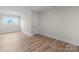 Finished basement with neutral walls and wood-look floors at 3202 Riley Ave, Charlotte, NC 28269