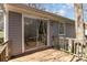 Back porch with sliding glass doors offers relaxing outdoor living space at 3428 Braewick Pl, Charlotte, NC 28227