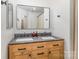 Bathroom featuring a double sink vanity with modern fixtures and ample counter space at 3428 Braewick Pl, Charlotte, NC 28227