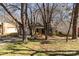Charming single-story home with a well-maintained front yard and mature trees offering shade and curb appeal at 3428 Braewick Pl, Charlotte, NC 28227