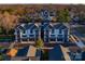 Aerial view showcasing a newly built townhome community with modern designs at 4207 Walker Rd, Charlotte, NC 28211