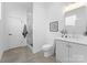 Modern bathroom featuring a glass-enclosed shower, sleek vanity, and stylish finishes for a spa-like feel at 4207 Walker Rd, Charlotte, NC 28211