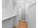 Spacious walk-in closet with ample shelving and hanging space, offering plenty of storage solutions at 4207 Walker Rd, Charlotte, NC 28211
