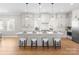 Modern kitchen with an island, pendant lighting, and stainless steel appliances at 4207 Walker Rd, Charlotte, NC 28211