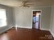 Hardwood floors, view of a window and doorway to the kitchen at 437 & 437 1/2 Hope St, Rock Hill, SC 29730