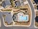 Community clubhouse and pool, showcasing parking, landscaping, and overall layout from an aerial perspective at 5050 Watersail Way, Lake Wylie, SC 29710