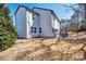 Spacious backyard featuring a patio area, a lush lawn, and a charming soccer goal for outdoor enjoyment at 5050 Watersail Way, Lake Wylie, SC 29710