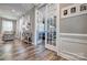 Bright and airy living room featuring hardwood floors, and French doors at 5050 Watersail Way, Lake Wylie, SC 29710
