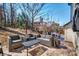 Cozy outdoor patio with comfortable seating and a coffee table, ideal for relaxing and enjoying the peaceful surroundings at 5050 Watersail Way, Lake Wylie, SC 29710