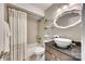 Bathroom with a modern vanity and tub/shower combination at 509 N Graham St # 2D, Charlotte, NC 28202