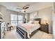 Comfortable bedroom with a large window and neutral decor at 509 N Graham St # 2D, Charlotte, NC 28202