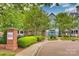 Well-manicured exterior of Fourth Ward Square Condominiums with lush greenery and charming facade at 509 N Graham St # 2D, Charlotte, NC 28202