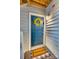 Charming front door with a decorative wreath and 'Welcome Home' mat at 509 N Graham St # 2D, Charlotte, NC 28202