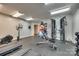 Gym equipped with modern exercise machines, free weights, and fitness accessories at 509 N Graham St # 2D, Charlotte, NC 28202