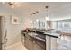 Modern kitchen featuring granite countertops, stainless steel appliances, and open layout at 509 N Graham St # 2D, Charlotte, NC 28202