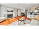 Comfortable living room with wood floors, fireplace, and kitchen access at 509 N Graham St # 2D, Charlotte, NC 28202