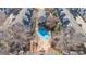 Overhead shot showcasing the community pool nestled among stylish townhomes and lush landscaping at 525 N Graham St # 3B, Charlotte, NC 28202