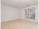 Bright and airy bedroom with a large window at 525 N Graham St # 3B, Charlotte, NC 28202