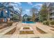 Apartment community with a pool, fire pit and common area in an attractive landscaped setting at 525 N Graham St # 3B, Charlotte, NC 28202