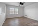 Bright, spacious bedroom with natural light and laminate wood flooring at 5337 Orchid Bloom Dr, Indian Land, SC 29707