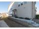 Home exterior featuring a low wall with a front door and walkway at 5337 Orchid Bloom Dr, Indian Land, SC 29707