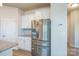 Kitchen area with stainless steel appliances, granite countertops, and tiled backsplash at 5337 Orchid Bloom Dr, Indian Land, SC 29707