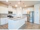 Bright kitchen showcasing white cabinets, stainless appliances, and granite countertops at 5337 Orchid Bloom Dr, Indian Land, SC 29707