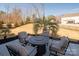 Enjoy the outdoor firepit with this great backyard view at 865 Kathy Dianne Dr, Fort Mill, SC 29707