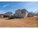 Spacious fenced backyard with a well-maintained lawn and patio area perfect for outdoor entertaining at 865 Kathy Dianne Dr, Fort Mill, SC 29707