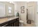 Stylish bathroom with granite countertops, modern fixtures, and a glass-enclosed shower at 865 Kathy Dianne Dr, Fort Mill, SC 29707